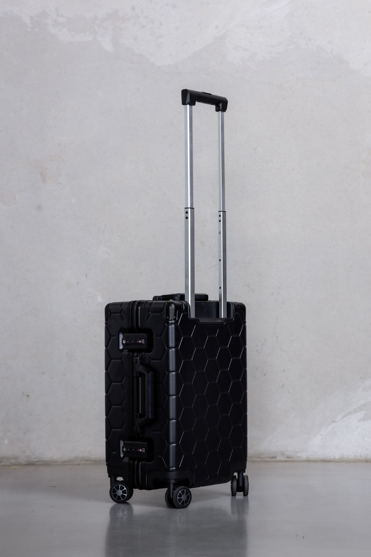 Romeo Embossed Hexagon Suitcase Jet Black